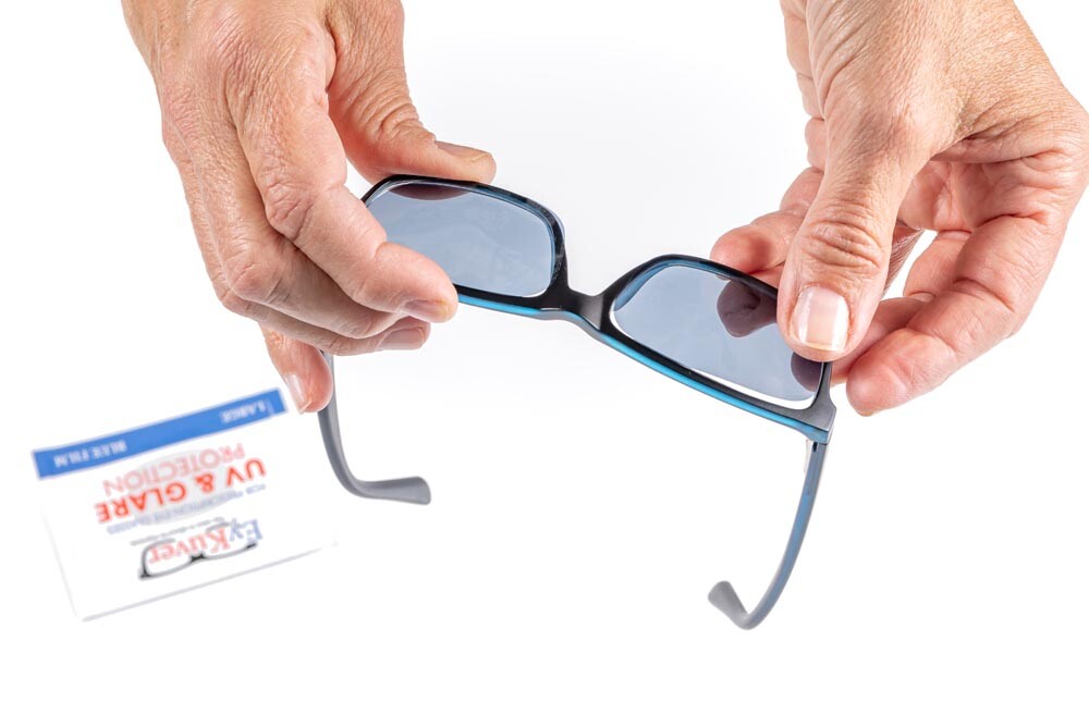 Inexpensive tinted stickers turn eyeglasses into sunglasses